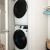 Large laundry area with stackable washer and dryer